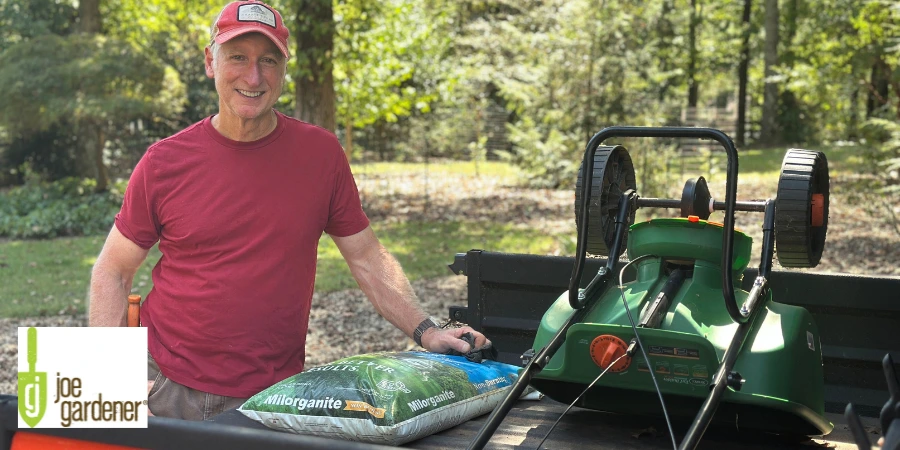 Joe Gardener standing with Milorganite fertilizer