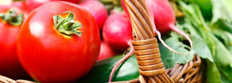 Bright red tomatoes like these can benefit from slow-release fertilizers like Milorganite. 