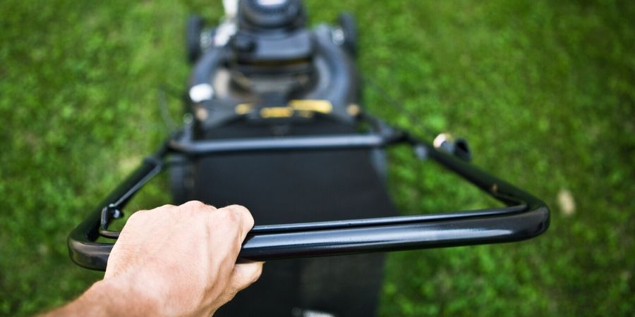 man mowing lawn