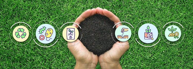 hands holding milorganite fertilizer