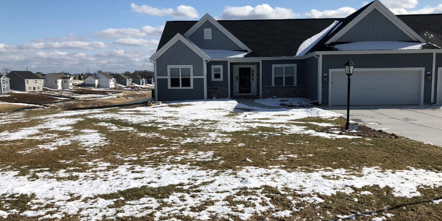 Lawn in spring with snow