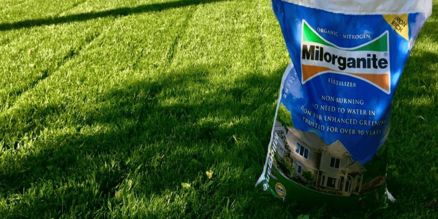 Bag of Milorganite fertilizer on the lawn