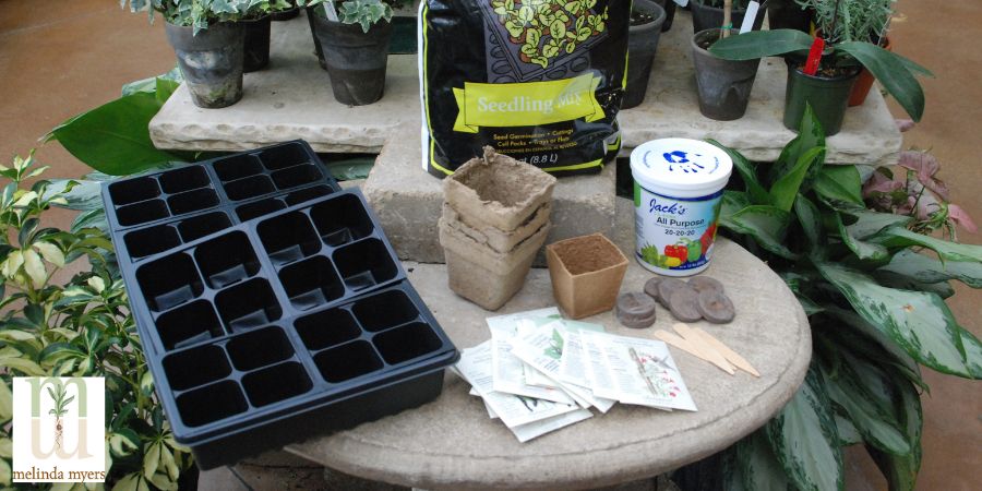 seed starting garden supplies on table